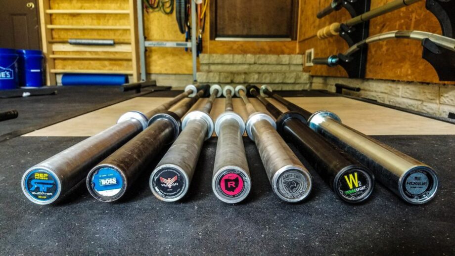 Several barbells laid out on a lifting platform