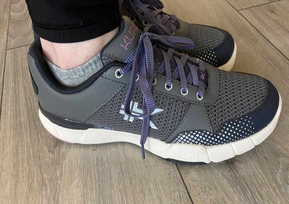 Side view of the KURU QUANTUM 2.0 shoes on our tester's feet.